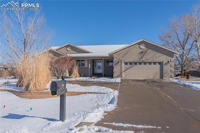 ranch-style home with a garage