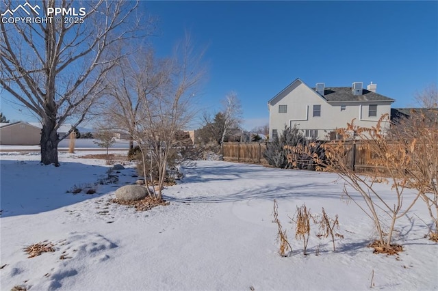 view of snowy yard