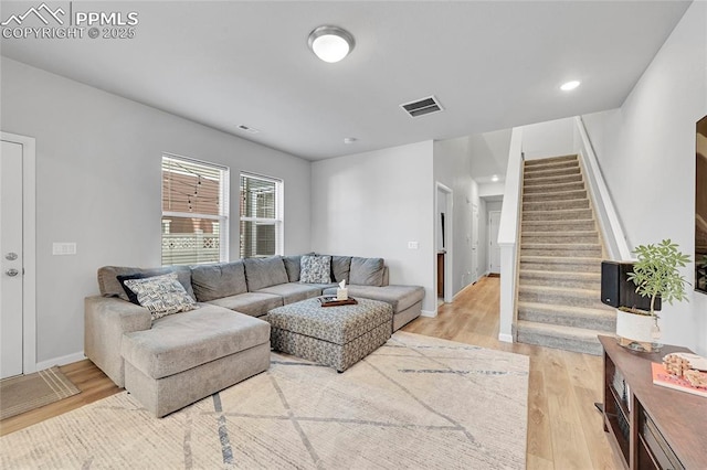 living room with hardwood / wood-style floors