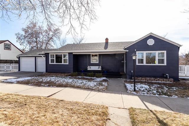 single story home featuring a garage