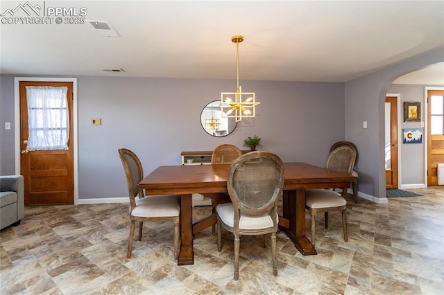 dining room featuring an inviting chandelier