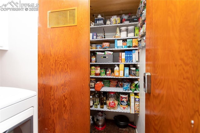 pantry featuring washer / dryer