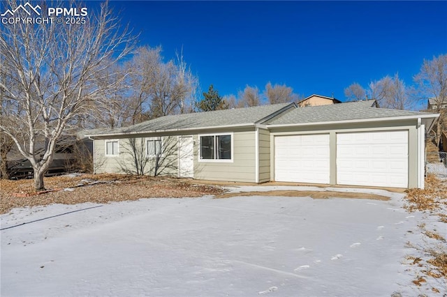 single story home with a garage