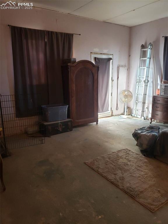 interior space featuring concrete flooring