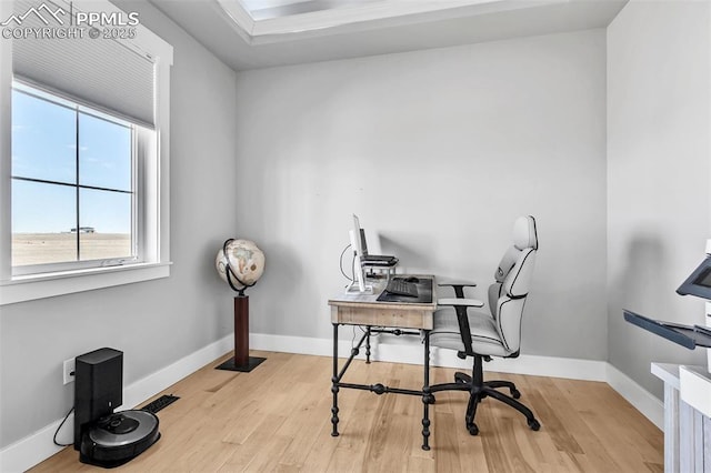 home office featuring light hardwood / wood-style floors