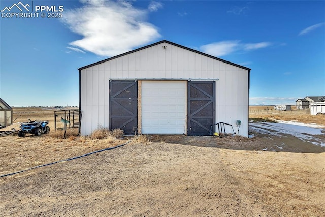 view of outdoor structure featuring a garage