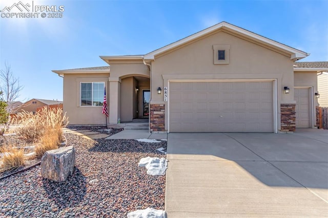 view of front of property featuring a garage