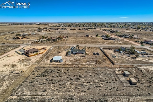 bird's eye view with a desert view