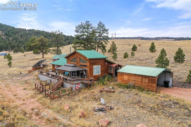 birds eye view of property featuring a rural view