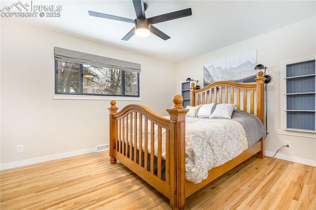 bedroom featuring light wood-type flooring and ceiling fan