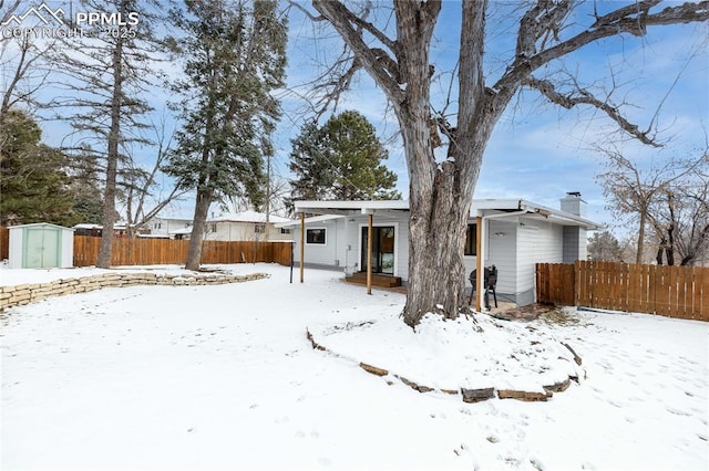 exterior space with a shed