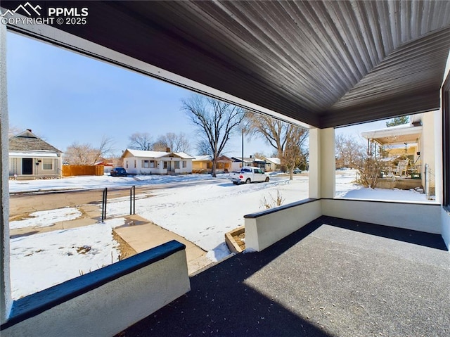 view of snow covered patio