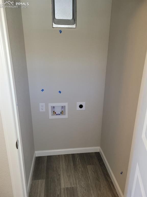 clothes washing area with hookup for a washing machine, dark hardwood / wood-style flooring, and electric dryer hookup