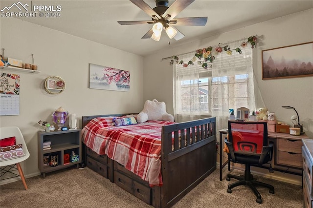 bedroom with ceiling fan and carpet flooring