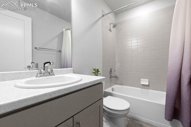 full bathroom featuring toilet, vanity, and shower / bath combo with shower curtain