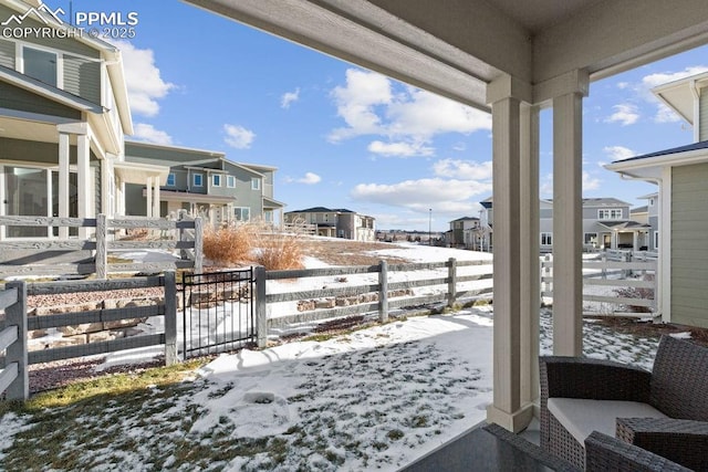 view of snow covered patio