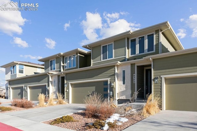 prairie-style home featuring a garage