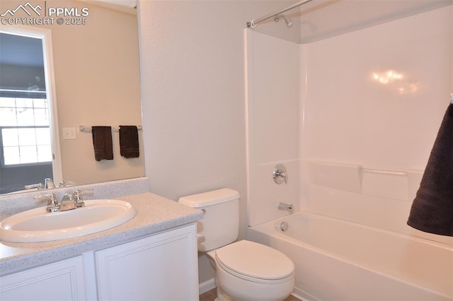 full bathroom featuring toilet, tub / shower combination, and vanity