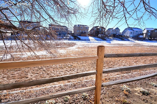 view of yard layered in snow