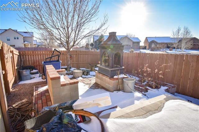 view of snow covered patio