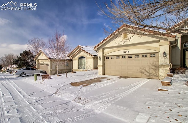 view of front of house with a garage