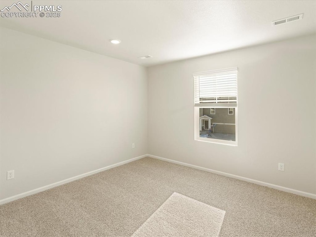 empty room with carpet floors