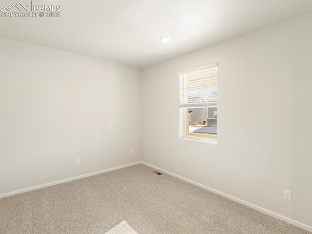 unfurnished room with carpet