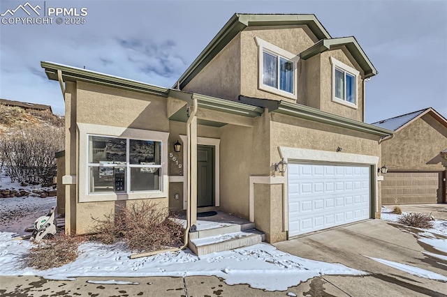 view of front of property with a garage