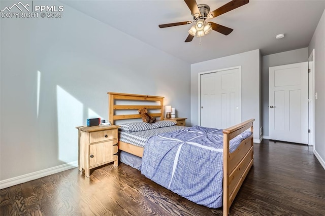 bedroom featuring dark wood-type flooring and ceiling fan