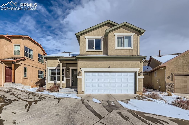 view of front of property with a garage