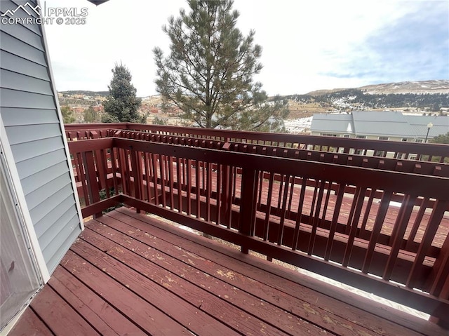 deck with a mountain view