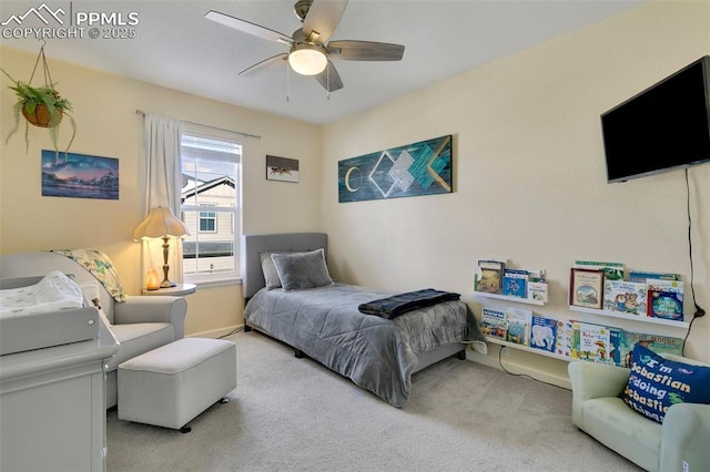 bedroom with ceiling fan and carpet flooring