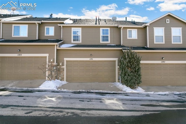 view of property with a garage