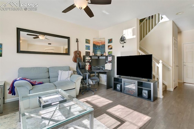 living room with ceiling fan and hardwood / wood-style floors