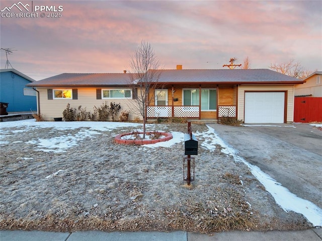 single story home featuring a garage