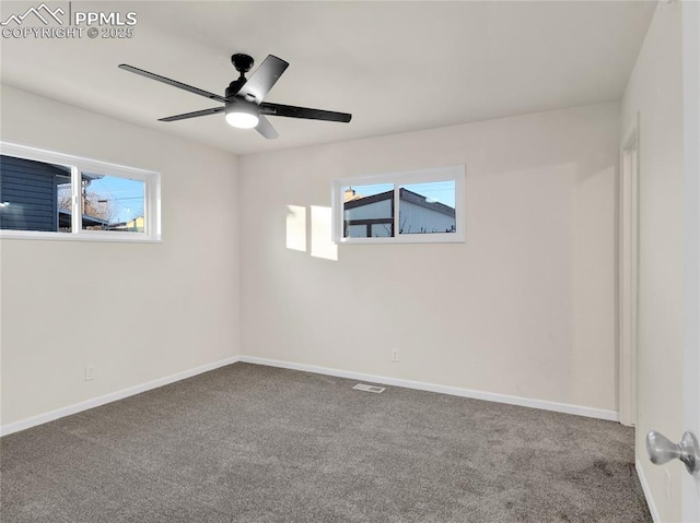 unfurnished room featuring ceiling fan, a healthy amount of sunlight, and carpet floors