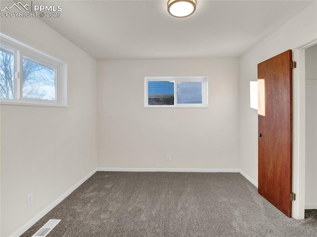 view of carpeted spare room