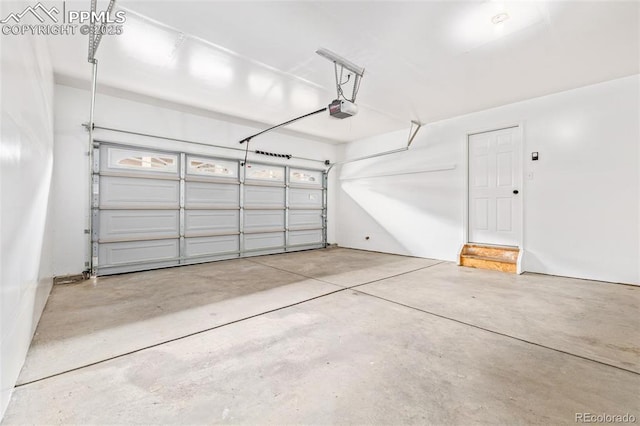 garage featuring a garage door opener