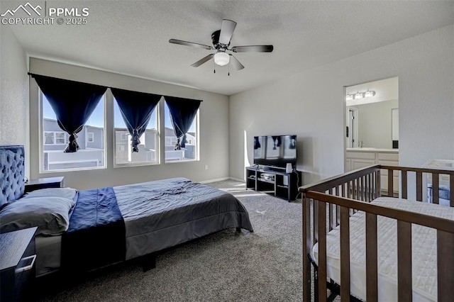 bedroom with ceiling fan, a textured ceiling, and carpet