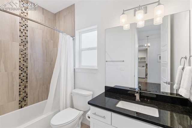 full bathroom with shower / bath combo with shower curtain, toilet, washer / dryer, and vanity