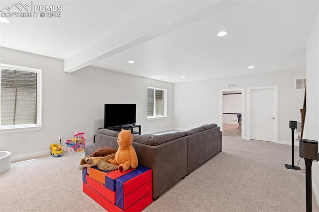 living room featuring light carpet and beamed ceiling