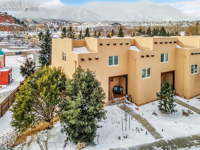 exterior space featuring a mountain view