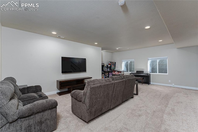 living room featuring light colored carpet, baseboards, recessed lighting, and a textured ceiling