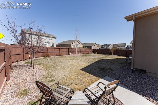 view of yard featuring a residential view