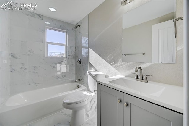 full bathroom with toilet, tiled shower / bath combo, and vanity