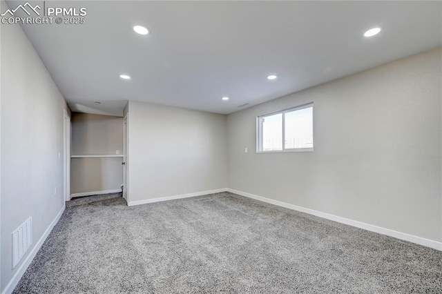 unfurnished room with carpet floors