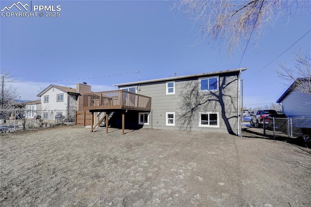 rear view of house with a deck