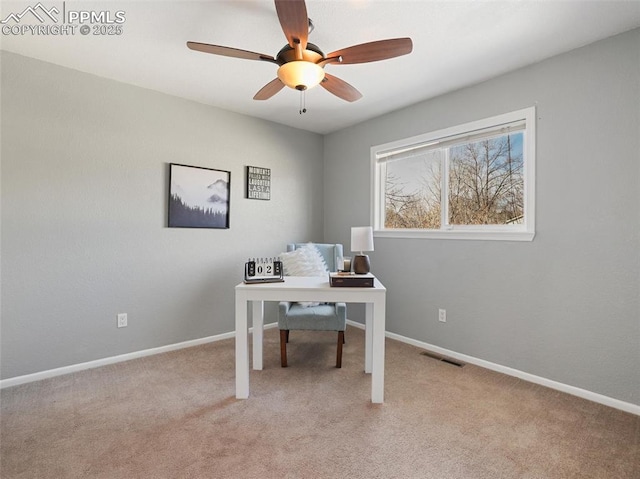 office area with ceiling fan and light colored carpet