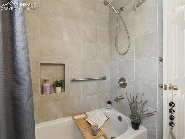 bathroom with shower / bathtub combination with curtain