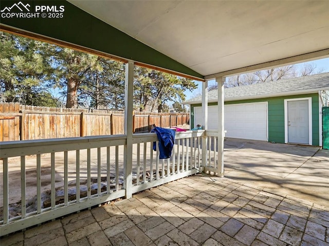 view of patio / terrace with a garage